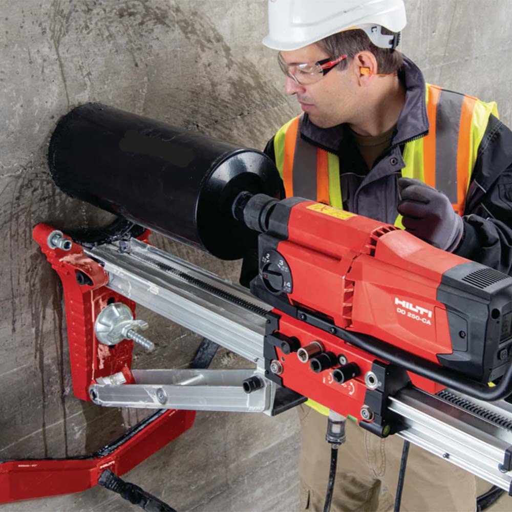 Clear View scanning employee use the core drill on a concrete wall